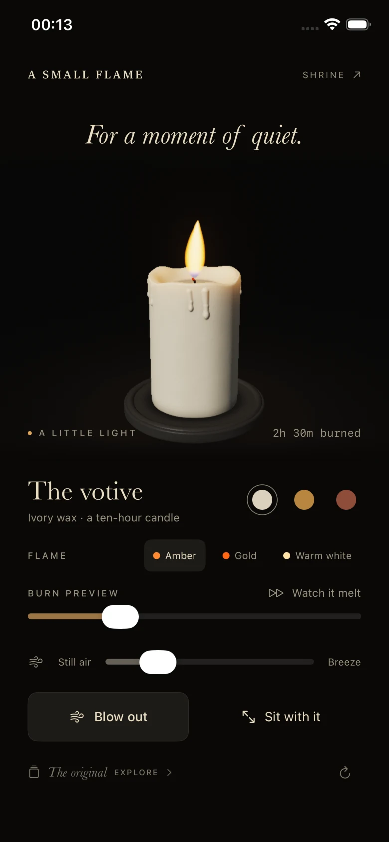 The original ivory candle burning in A Small Flame, with candle controls below