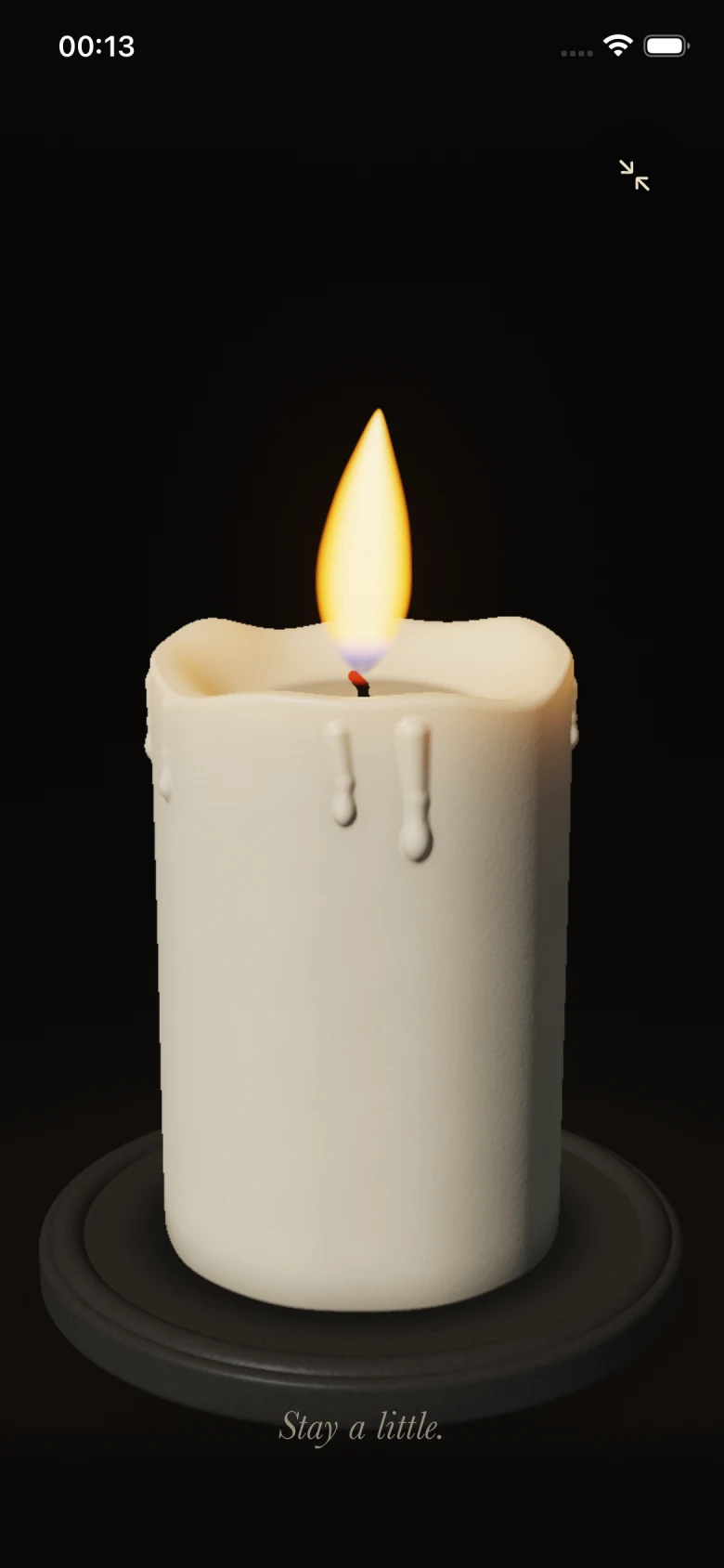 An ivory candle with an amber flame in the iOS prototype